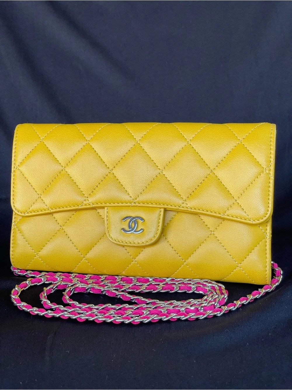AUTH. Chanel Flap trifold wallet with silver tone hardware.